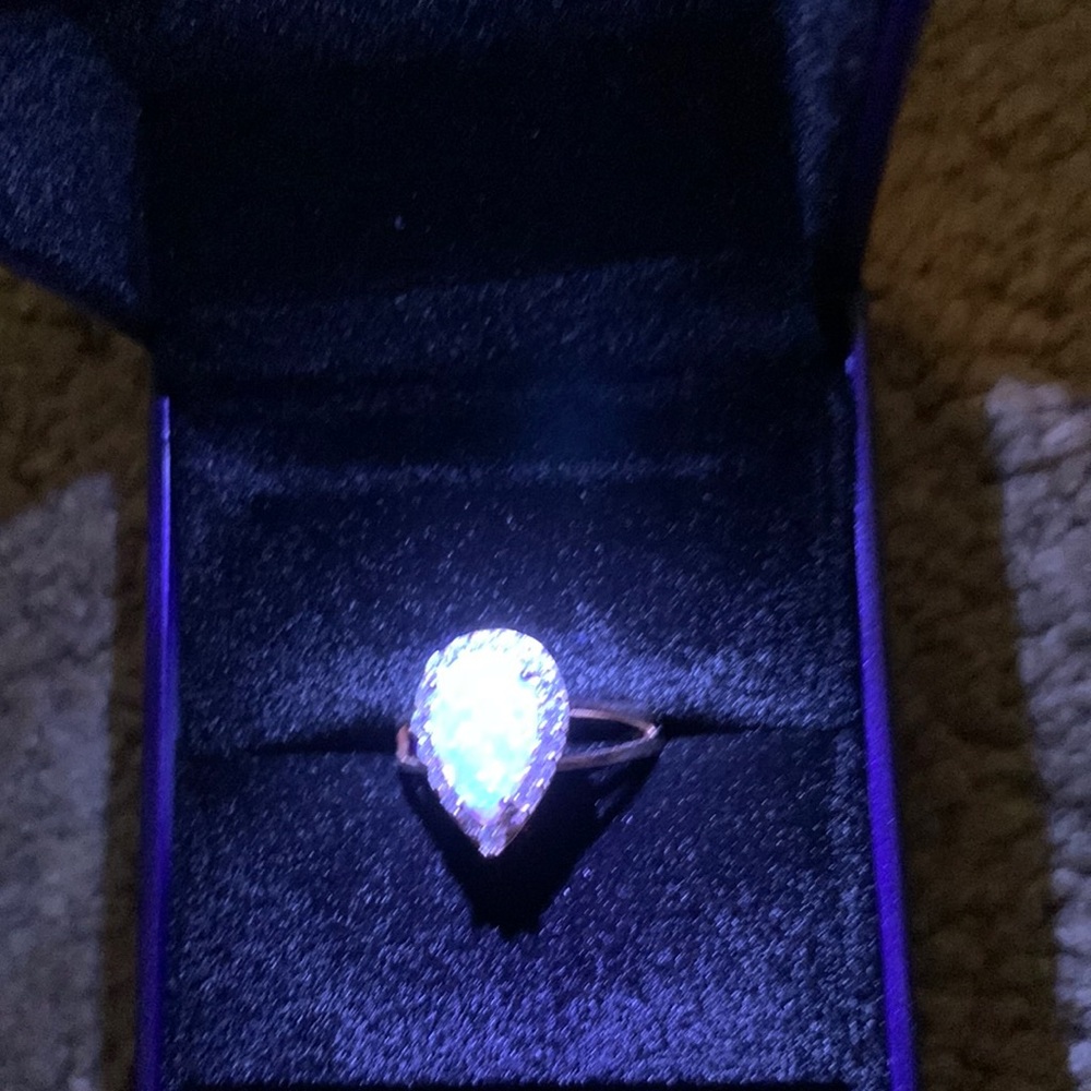 Blush and bar blue opal carved rim ring